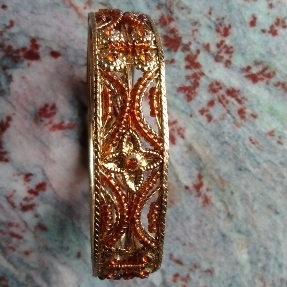 Cuff bracelet, brown gemstones in gold